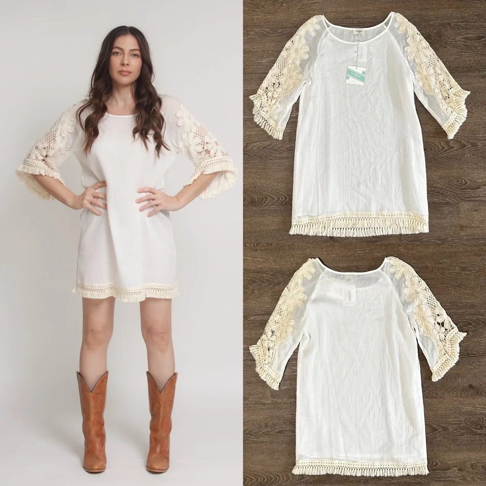 Umgee
Mini dress with floral crochet sleeves and fringe detail size S Small NWT - Picture 7 of 13